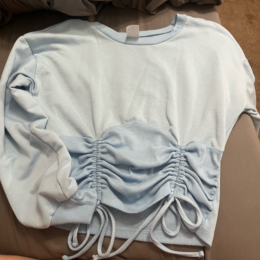 Long sleeve light blue blouse